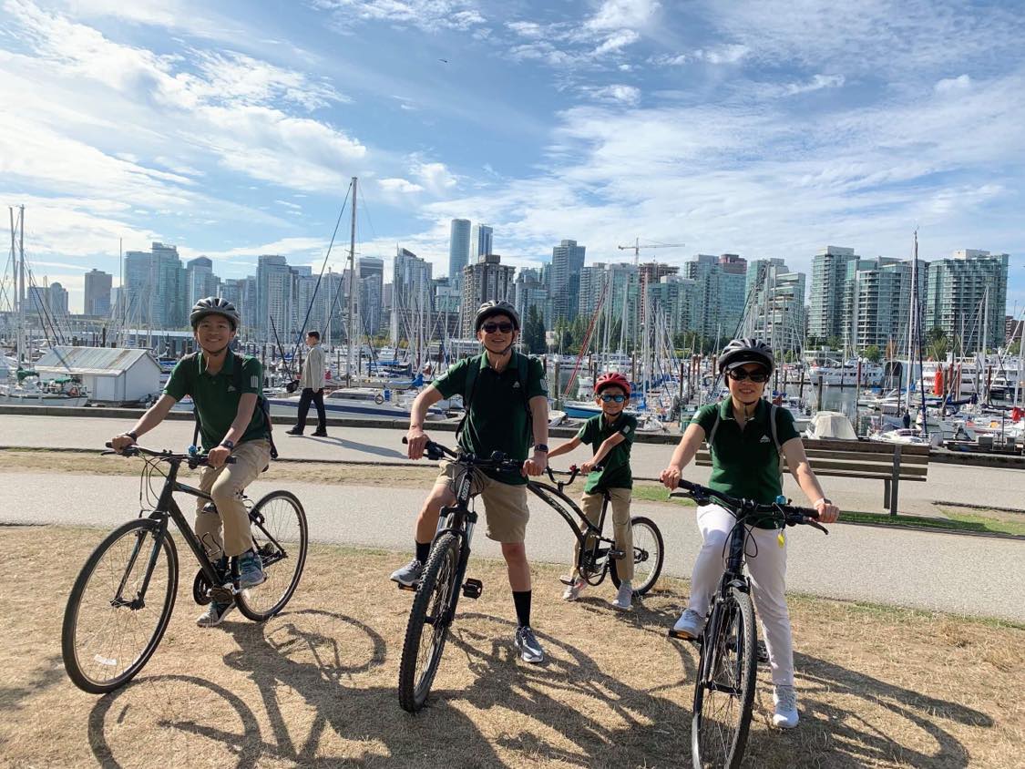 Family riding bikes in Vancouver
