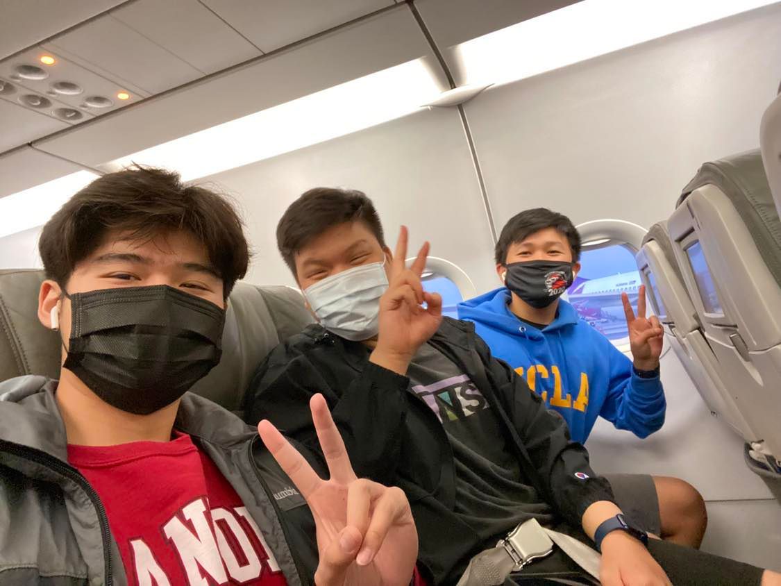 Manh, Casey, and Philip on their flight to SF